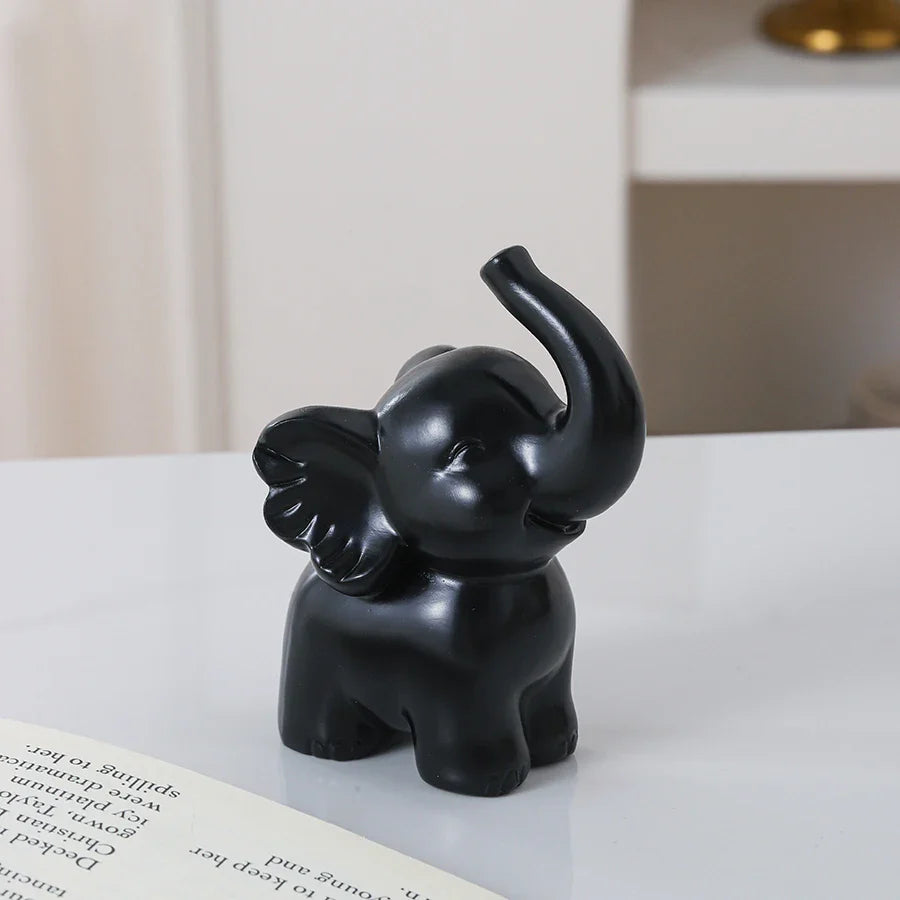 1pc Collectible figurine , Simple modern black and gold elephant ornament home decor small sculpture.