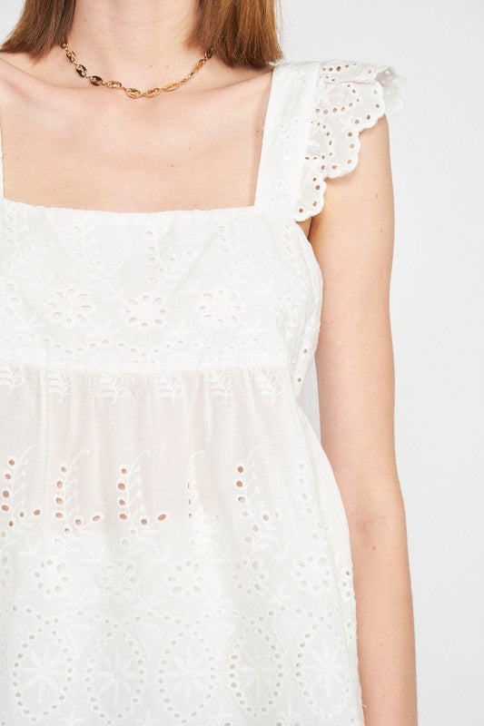 RUFFLE SLEEVE HEM EYELET TOP