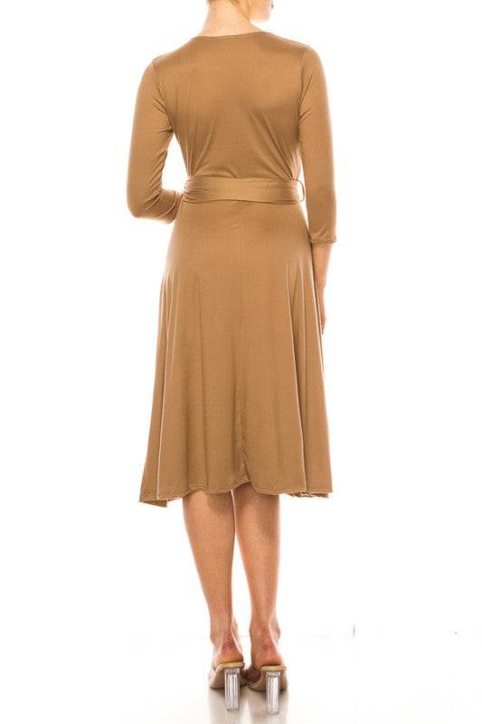 Solid faux wrap dress with deep V-neck