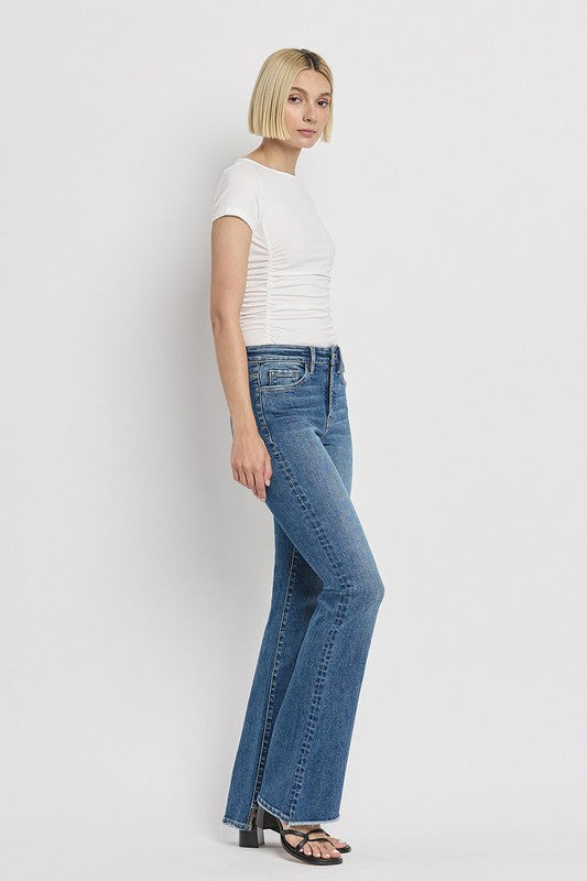 High Rise Slant Hem Flare Jeans