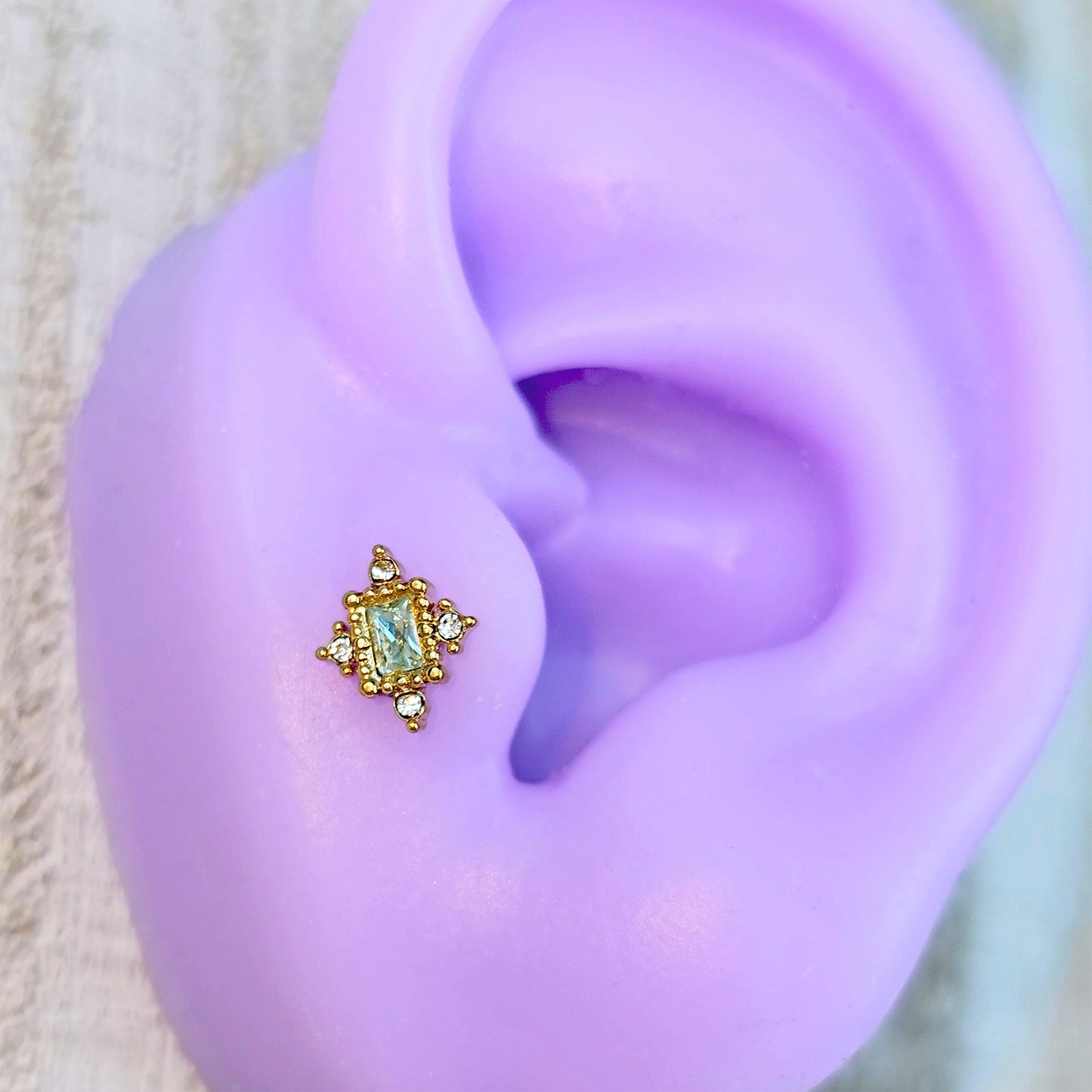 16G 1/4 Clear Blue Gem Gold Tone Regal Seal Cartilage Tragus Earring